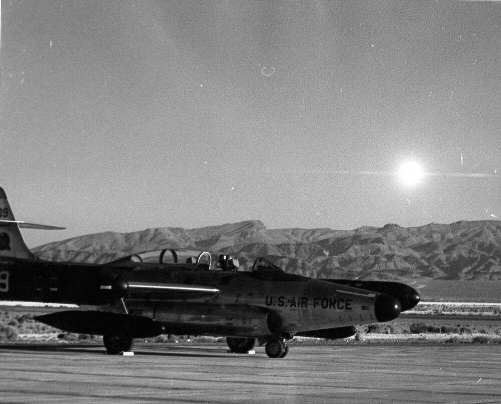 Plumbbob-John-1.5-kiloton-fireball-as-seen-from-Indian-Springs-Air-Base-Nevada-17-July-1957-with-Northrop-F-89J-Scorpion-in-foreground