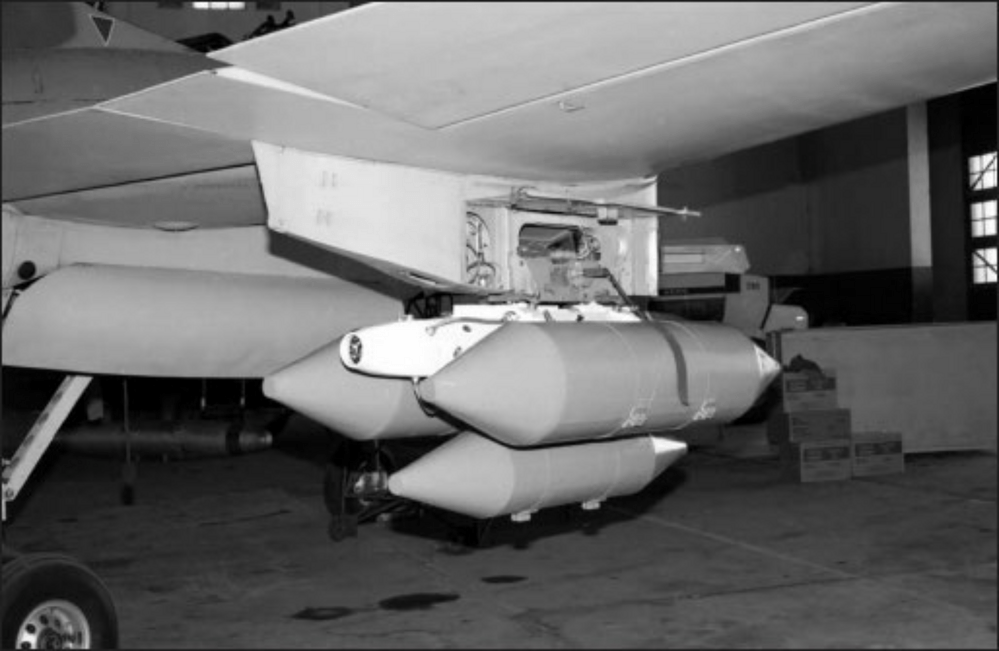 IA-58 Pucara weapons INC-100 napalm bombs on a triple ejector rack on A-561