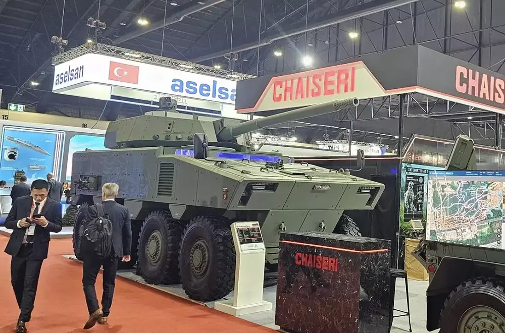 guardian-t-8x8-105mm-side-view-1200x793