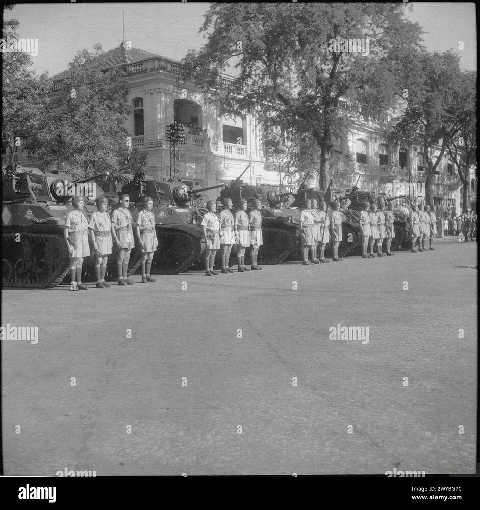 french-tank-crews-in-sourabaya-lined-up-in-front-of-their-tanks-in-preparation-for-a-military-parade-2WYBG7C