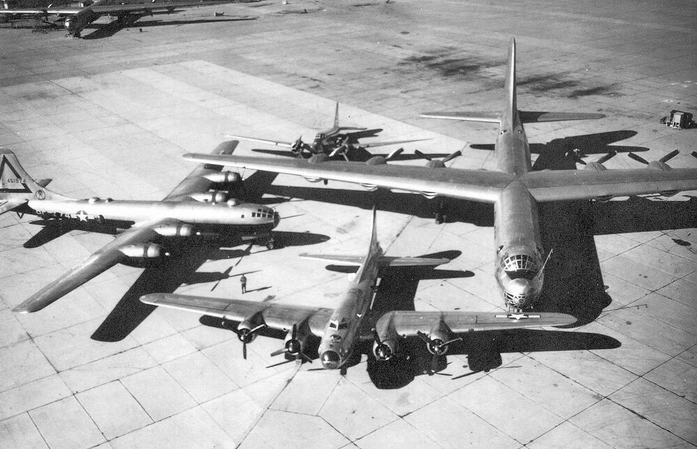 a-douglas-b-18-bolo-a-boeing-b-17-flying-fortress-a-boeing-b-29-superfortress-and-the-b-36-peacemaker-dominating-the-group-photo-with-a-230-foot-wingspan