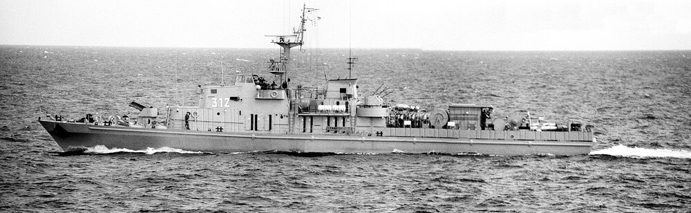 Eilsleben (312), the second in class of the Kondor II patrol minesweepers of the-then East German Navy. It is armed with three twin 25mm gun mounts and can carry mines. Crew: 40. This unit was seen close to the maritime Inner German Border where it was being employed as a spotter for all shipping of interest entering the Baltic