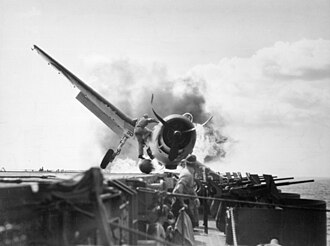 Burning_Grumman_F6F-3_Hellcat_of_VF-2_aboard_USS_Enterprise_(CV-6)on_10_November_1943(80-G-205473)