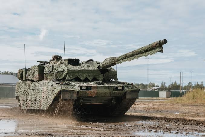 Leopard 2A7DK with a camouflage net