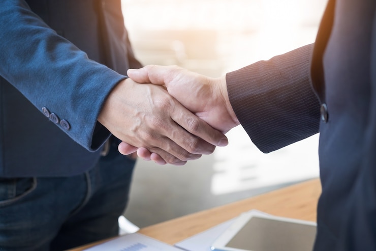two-confident-business-man-shaking-hands-meeting-office-success-dealing-greeting-partner-concept_1423-185