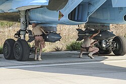 Fixing_KAB-500S_guided_bombs_to_a_Sukhoi_Su-34_at_Latakia_(1)