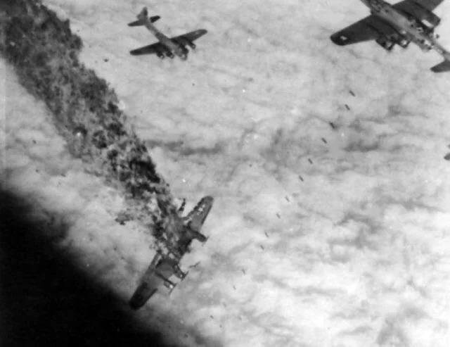 b-17-flying-fortress-blue-streak-going-down-in-flames-after-v0-50ekkmdj4h891