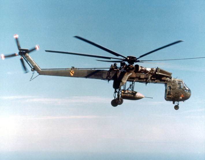 Sikorsky_Skycrane_carrying_parachute_bomb_c