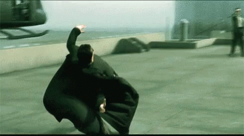 a-man-in-a-cape-is-flying-through-the-air-hcdtdkxktg3tabi7